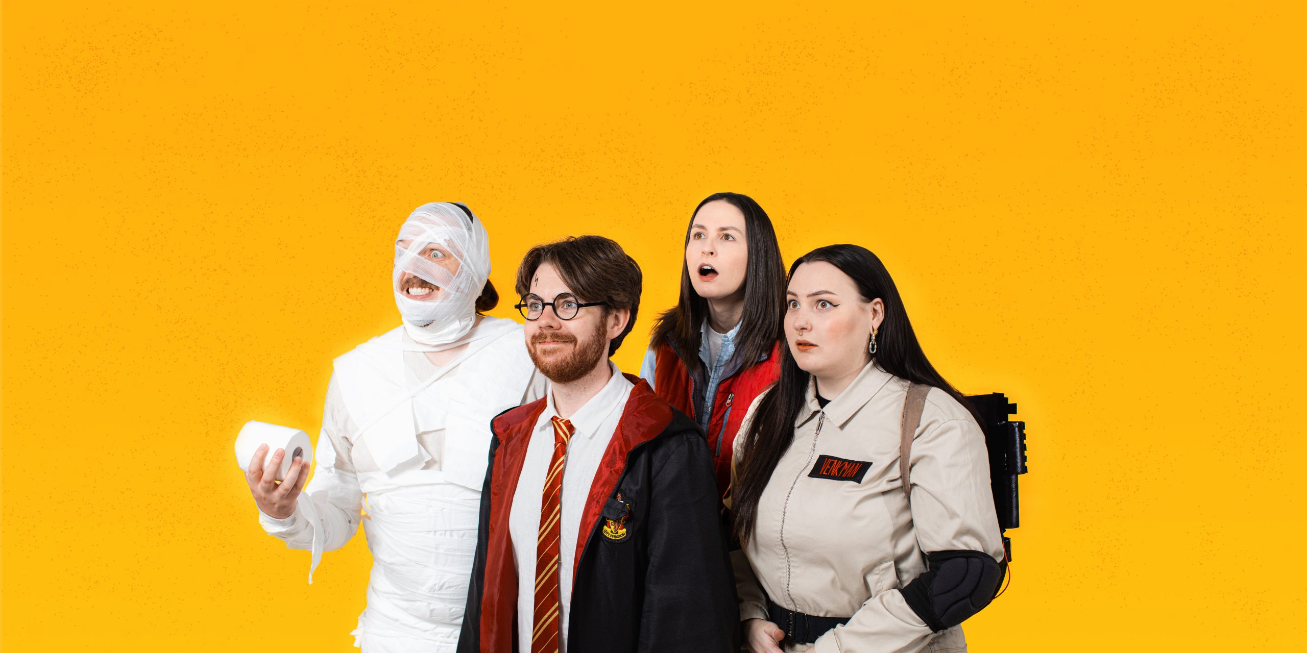 Four people dressed as characters from films